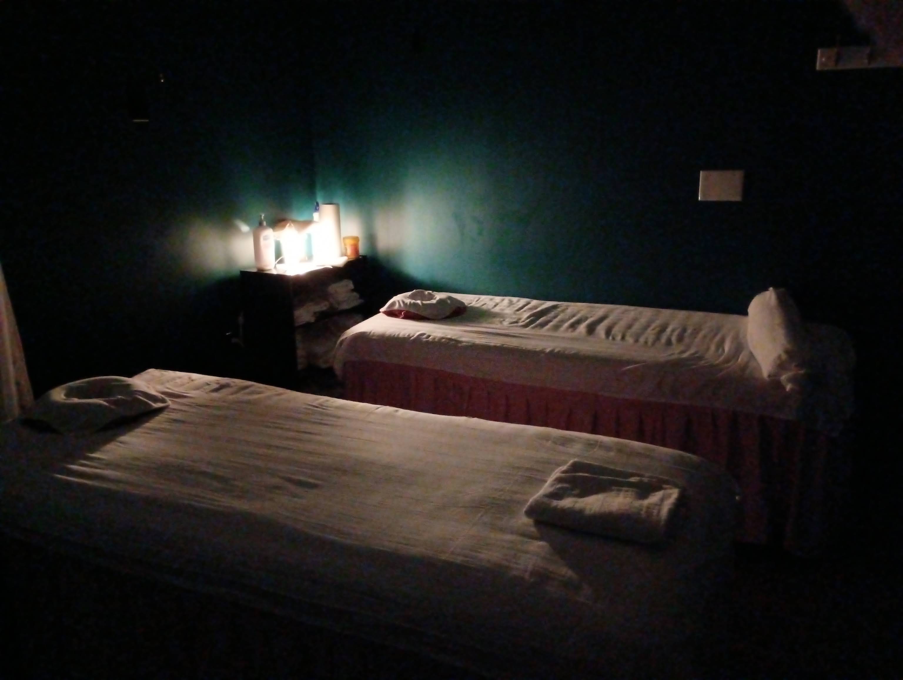 Sunflower massage room with softly glowing lamps